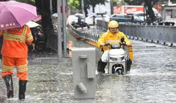 चीन में भारी वर्षा के लिये येलो अलर्ट जारी